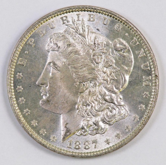 1887 P Morgan Silver Dollar.