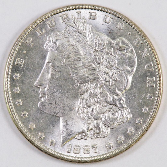 1887 P Morgan Silver Dollar.