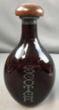 Red glass Scotch decanter with wood stopper