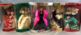 Group of 5 Holiday Barbies in original packaging