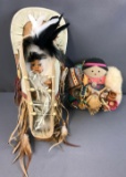 Group of Native American inspired decor, baby in papoose