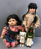 Group of 4 Native American dolls