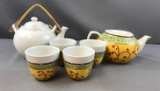 Group of teapots and cups