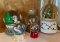 Group of five Peanuts snow globes