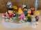 Group of department 56 peanuts Christmas porcelain figurines