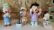 Group of four Lenox peanuts Christmas porcelain figurines