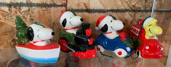 Group of six vintage Peanuts vehicle Christmas ornaments