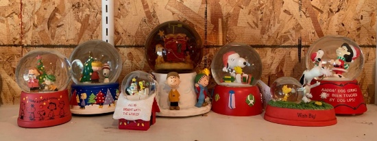 Group of Seven peanuts Christmas snow globes