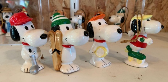 Group of four vintage Peanuts snoopy sports Christmas ornaments