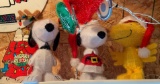 Group of four peanuts snoopy Christmas 3-D light up lawn ornaments