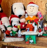 Shelf lot of peanuts Christmas plush dolls