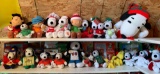 Shelf lot of peanuts Christmas plush dolls