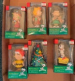 Group of six Peanuts Christmas ornaments