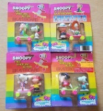 Lot of 4 Snoopy Free Wheeling Action Skateboards