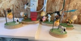 Group of five hallmark peanuts gallery statues