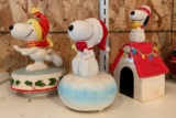 Group of three Peanuts Snoopy musical figurines