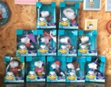 Group of 11 Snoopy and Friends World Tour Collection