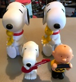 Group of Vintage peanuts banks and wind up toys