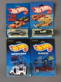 Group of 4 Hot Wheels Die-Cast Vehicles In Original Packages