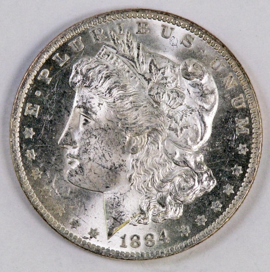 1884 O Morgan Silver Dollar.