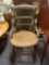 Antique wood chair with Cained seat