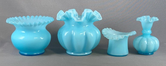 Group of four blue or pink glass items