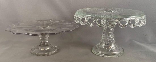 Group of two vintage press glass cake stands