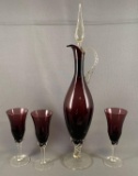 Four piece amethyst glass ewer set with stem glasses
