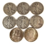 Group of eight silver half dollars