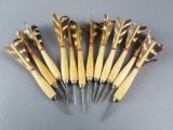 Group of a dozen vintage throwing darts.