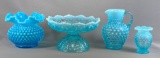 Group of four blue opalescent glass items
