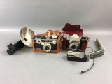 Group of 2 Vintage Camera with accessories.