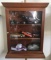 Display case with car pieces