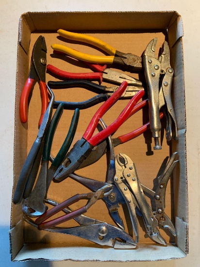 Group of pliers, vice grips, and more