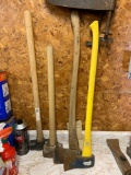 Group of axes and sledgehammers