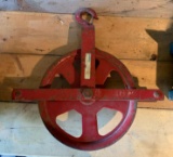 Red industrial metal pulley