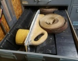 Drawer of plastic shims and sanding materials