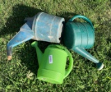 Group of three watering buckets