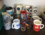 Group of advertising coffee cups and more