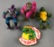 Group of 4 Teenage Mutant Ninja Turtle action figures and toy