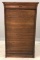Antique wooden roll front cabinet