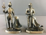 Group of 2 Metal Knights Pipe Rests