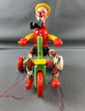 Vintage Wooden Pull Toy clown on tricycle