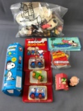 Group of Peanuts figures, vehicles and more