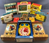 Group of 11 Fisher Price wind up musical toys
