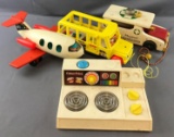Group of 4 Fisher Price and Playskool toys