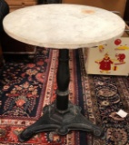 Antique marble and cast iron round table