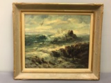 Framed Oil Painting of water crashing on rocks and seagulls