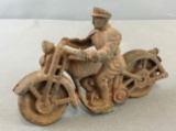 Vintage Cast-Iron Man on a Motorcycle