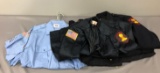 Group of uniform shirts and jackets